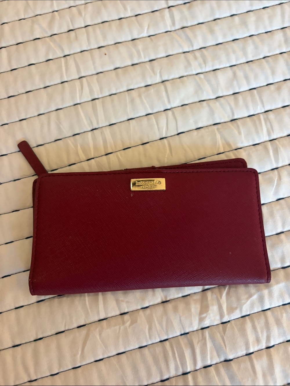 kate spade red wallet with gold logo